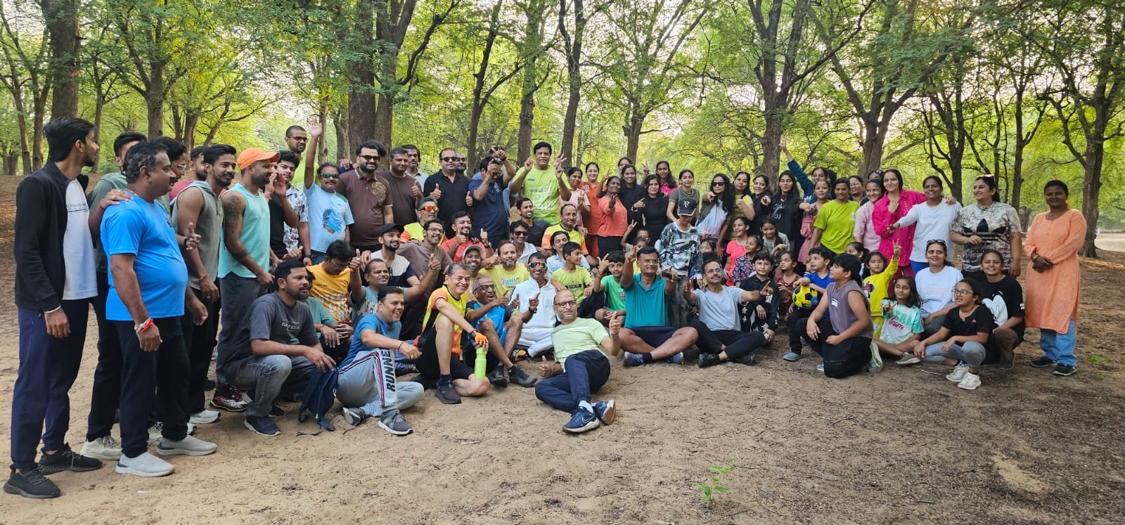 BCR members and families together beneath the trees