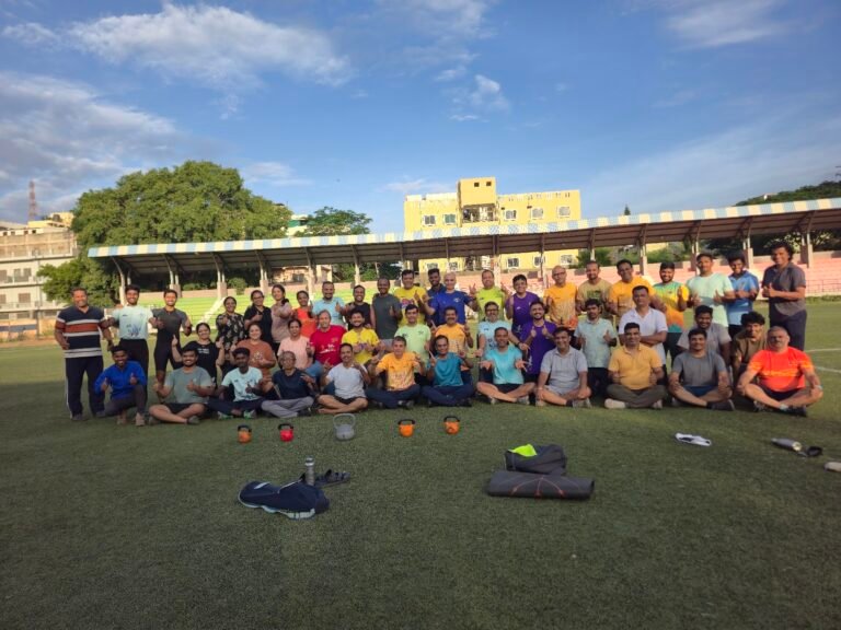BCR strength training group with kettlebells at the stadium